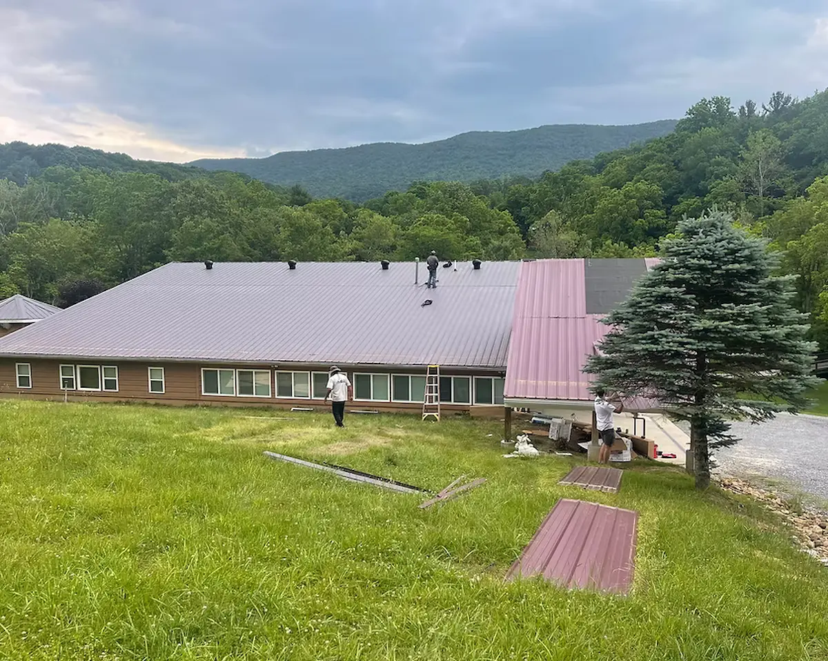 Large metal roof with mountain view