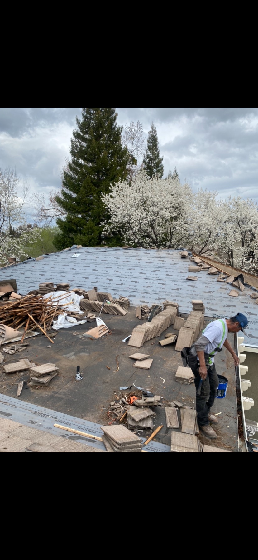 Shingle tear-off in progress